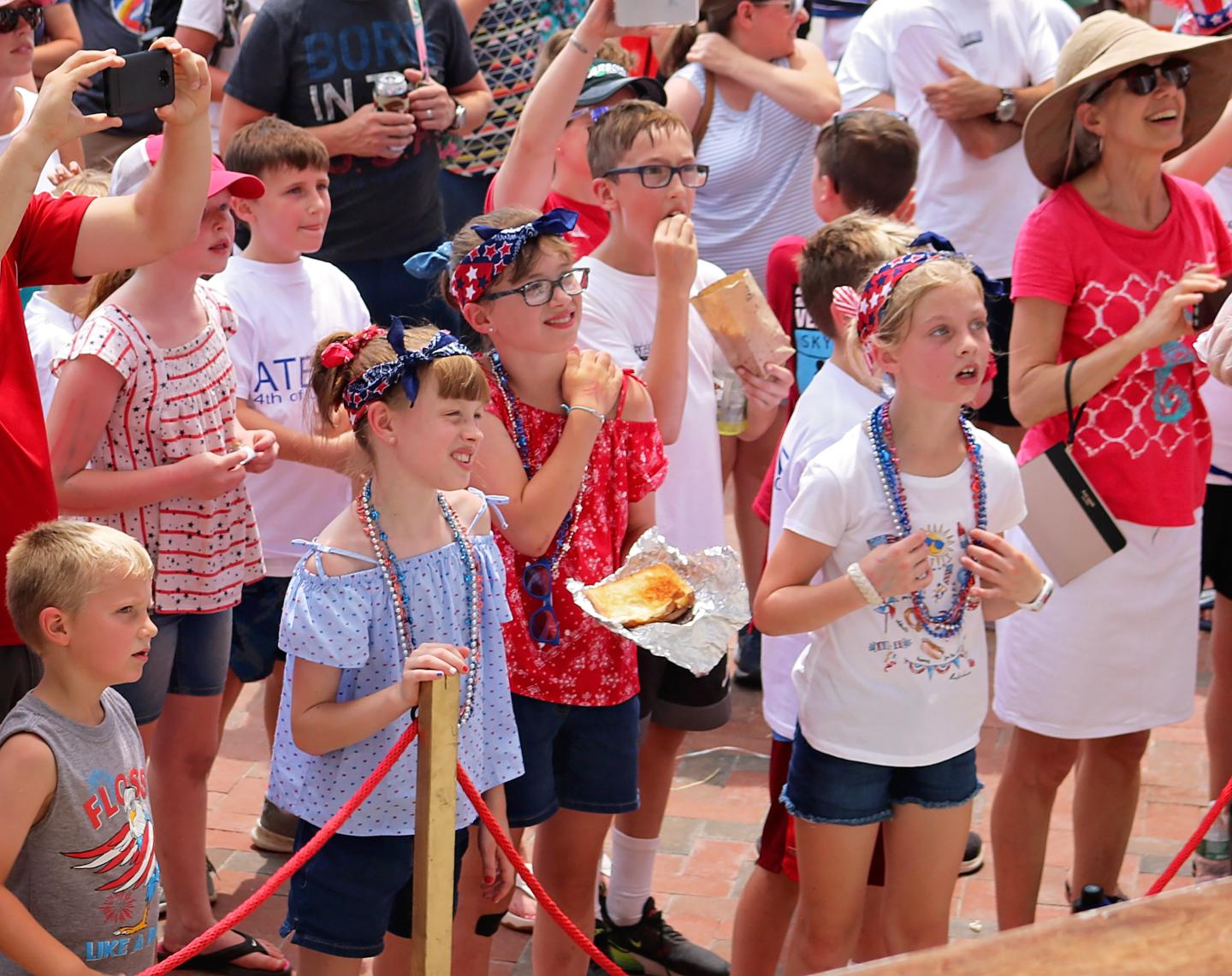 Crowd of children eagerly watching the Stowe Fourth of July parade.