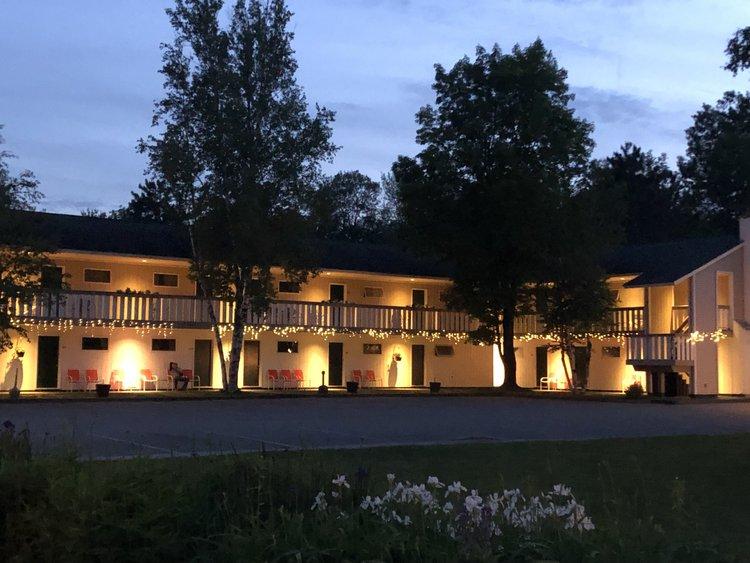 Stowe Motel units at night with exterior lighting