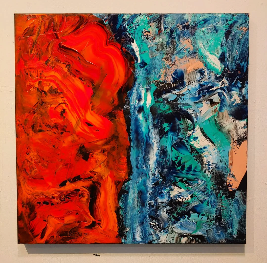 Abstract painting with vibrant red and blue swirling patterns