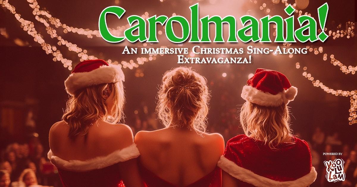 Three people in Santa hats, festive lights overhead, viewed from behind.