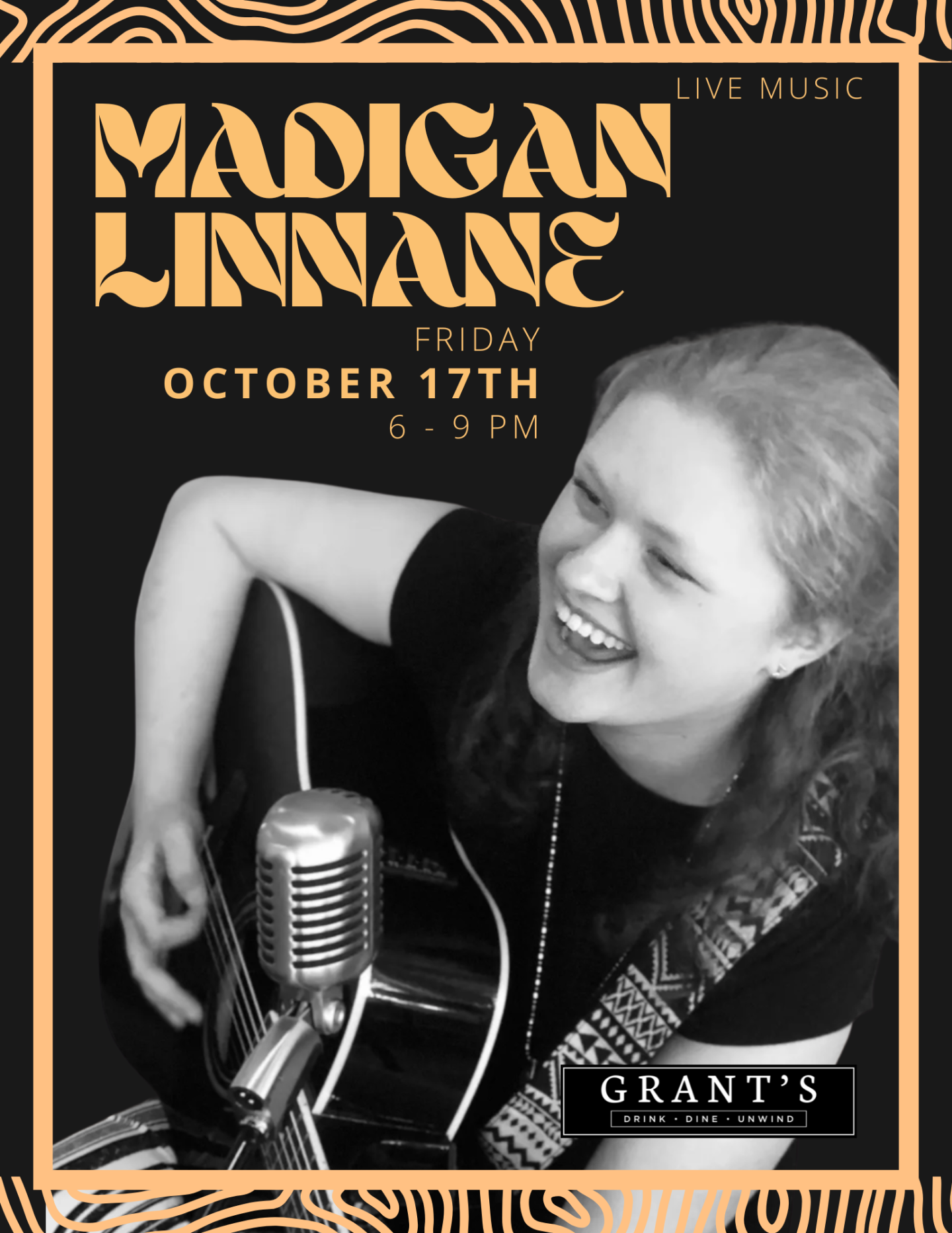 Smiling woman with guitar and vintage microphone, black and white photo.