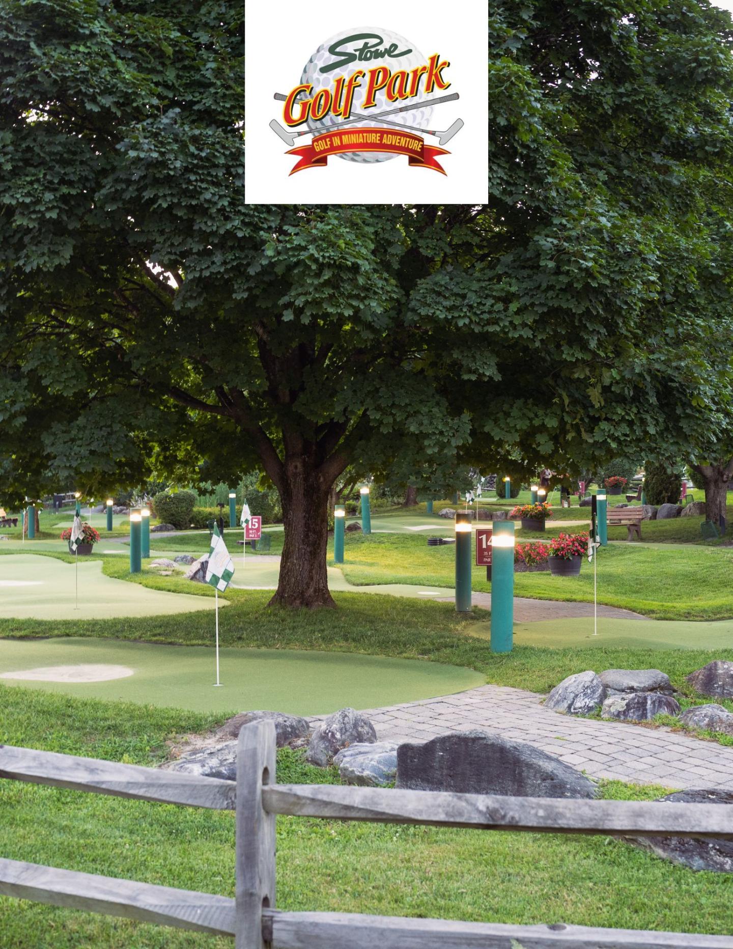 Mini golf course with trees and a wooden fence. Logo at the top.