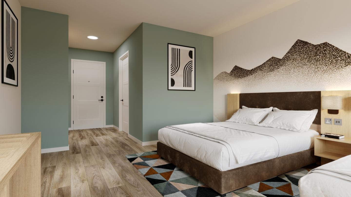 Modern hotel room with two beds, mountain mural, and wooden flooring.