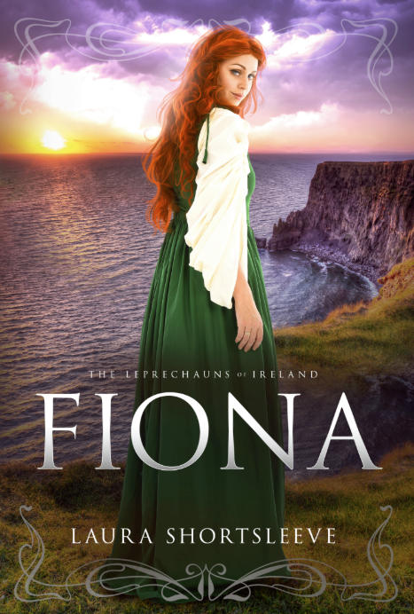 Red-haired woman in green dress stands on a cliff at sunset, ocean in background.