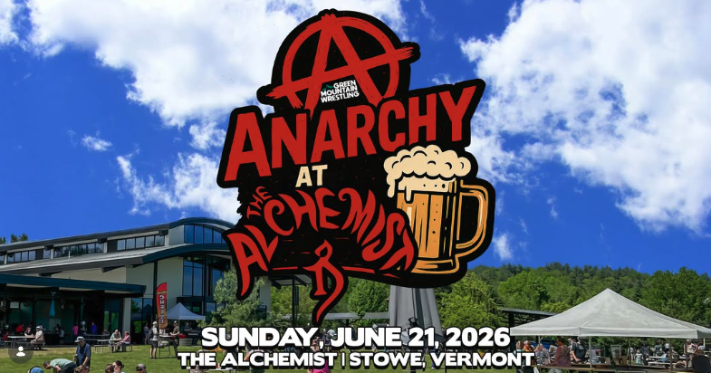 Brewery with event sign and tents on a sunny day.